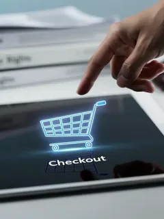 Digital shopping cart on tablet, symbolizing online purchases and new consumer protection laws.