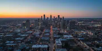 Dynamic city skyline at dusk, symbolizing robust real estate investment growth in 2026.